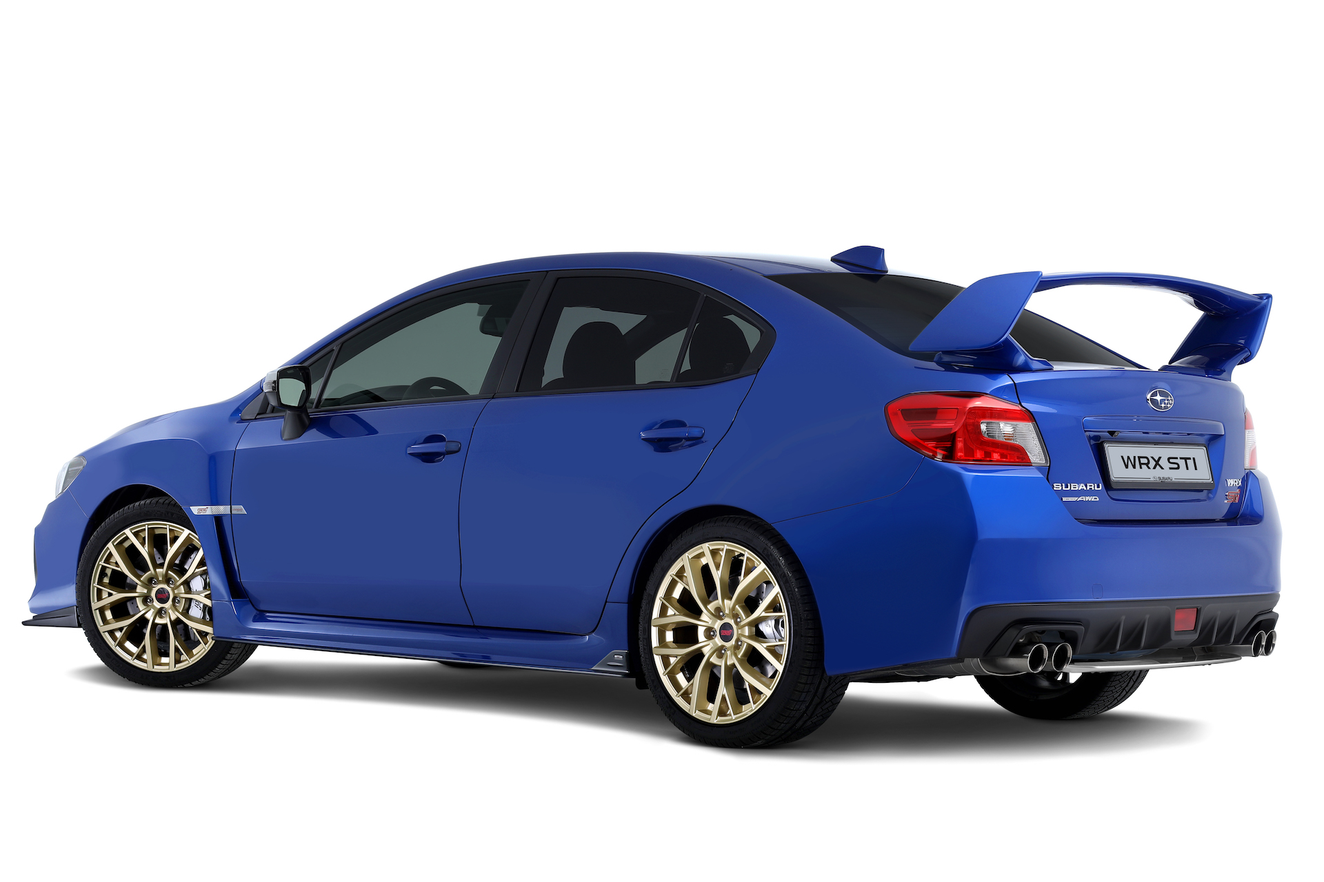 Subaru Impreza 3/4 laterale posteriore sinistra statica blu con cerchioni oro