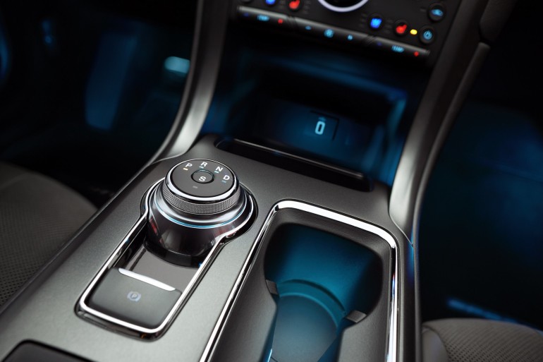 All 2017 Ford Fusions, including the Sport model pictured here, include a new rotary gear shift dial that enhances the spaciousness of the cabin. New features including driver assist technologies, give consumers a combination of convenience, entertainment and a feeling of confidence behind the wheel.